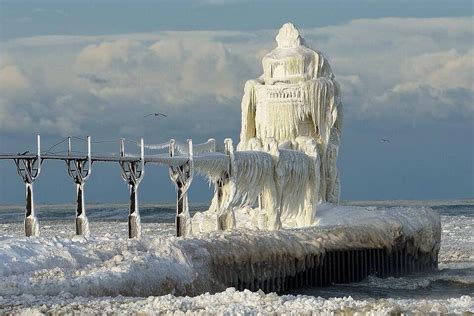 St. Joseph lighthouse, Lake Michigan, covered in ice [Found] : pics