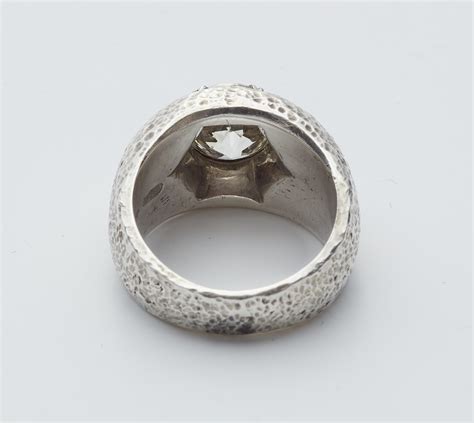 A Sterling silver diamond solitaire ring - Lot 182