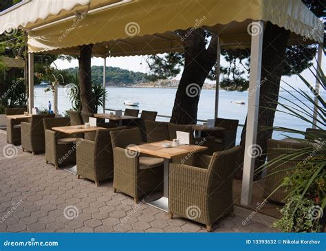 Restaurant on the coast stock photo. Image of cloth, vacation - 13393632