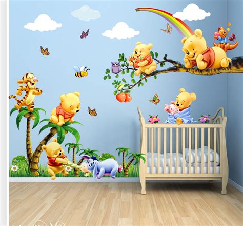 Cute Baby room with winnie the pooh themed wallpaper and cute wooden ...