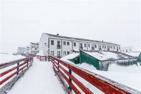 White Inuit living blocks, on the street after heavy snowfall Nuuk ...