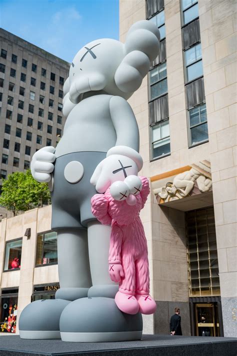 KAWS unveils new 18-foot sculpture at Rockefeller Center | 6sqft