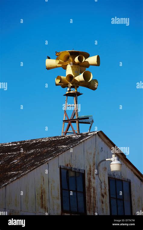 USA Oklahoma Picher Tornado siren atop abandoned building Stock Photo ...