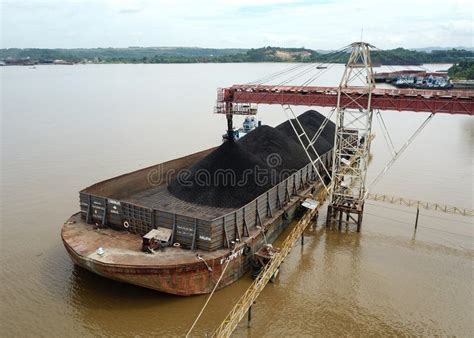 Loading Coal Onto the Barge from the Stock Pile, Aerial View Editorial ...