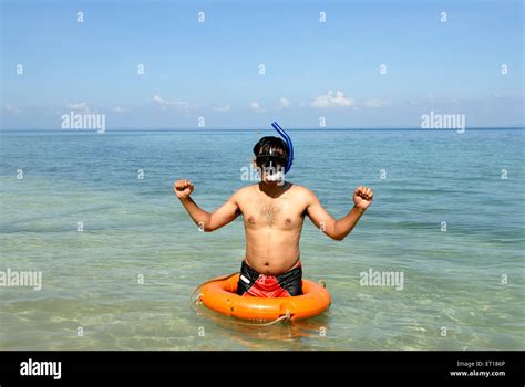 Man ready for snorkeling Radhanagar beach Havelock Islands Andaman and ...