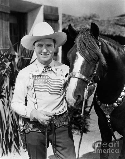 Gene Autry Holding Champion Photograph by Bettmann - Pixels