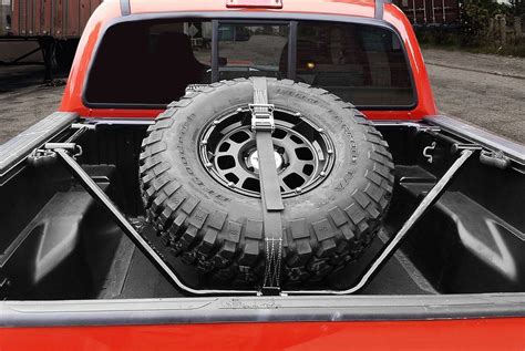 Truck Bed Mounted Spare Tire Carriers — CARiD.com