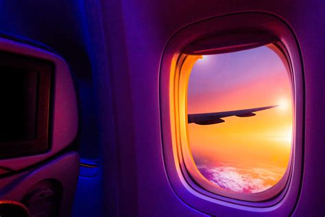 Aircraft window sunset - Globetrender