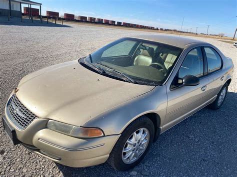 1999 Chrysler Cirrus LXI sedan, runs - Adam Marshall Land & Auction, LLC