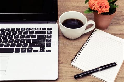 Laptop and Cup of Coffee with Flower on Desk Stock Image - Image of ...