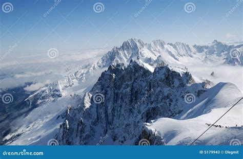 Snow Slope with Mountain-skiers Stock Image - Image of cold, alps: 5179943