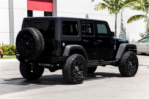 Black 4 Door Jeep Wrangler Rubicon