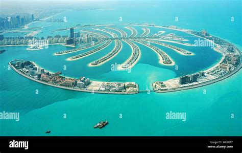 An aerial view of the Palm Jumeirah artificial island which resembles a ...