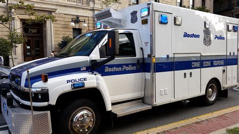 an ambulance is parked on the side of the road