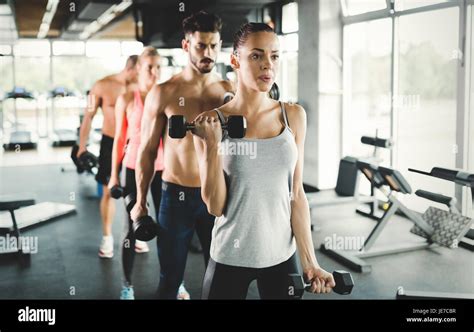 Group of people have workout in gym Stock Photo - Alamy