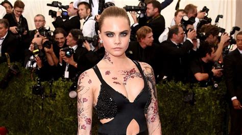 A Guide To Cara Delevingne's Tattoos (And Their Meanings)