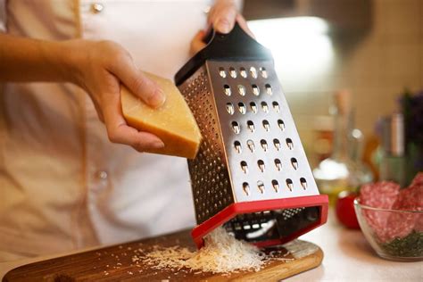 "The small round openings on your grater are used for shredding hard ...