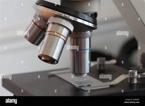 Microscope stage with slide and high power objective lens Stock Photo ...