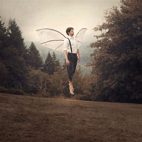 a man flying through the air while wearing a white shirt and black tie ...