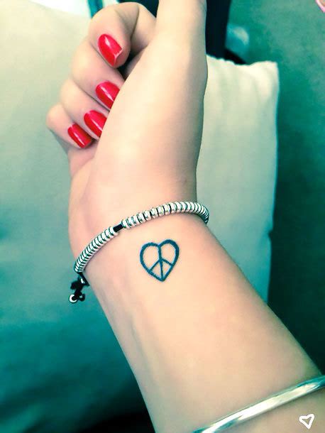 Peace Heart on Wrist Tattoo Idea