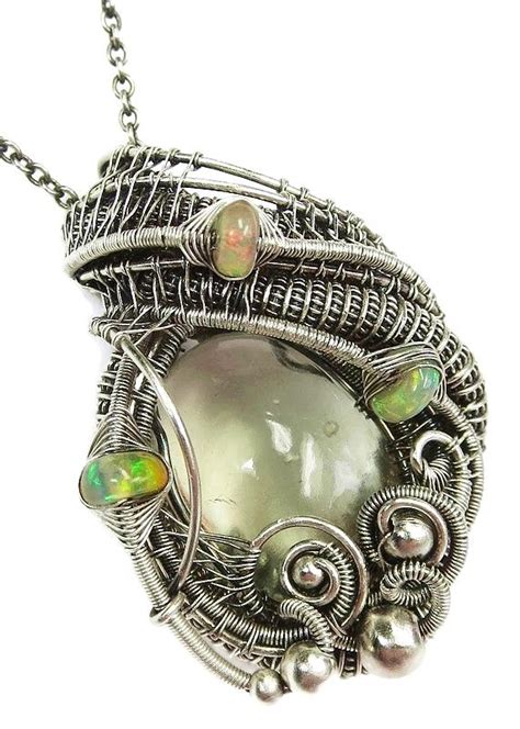 Libyan Desert Glass Wire-Wrapped Pendant with Ethiopian Welo Opals ...