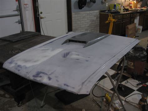 1967 Mustang Restoration: Bolting on a hood scoop