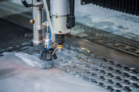 CNC water jet cutting machine Stock Photo by cookelma | PhotoDune