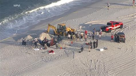 Beach rescue underway after sand collapse - Good Morning America