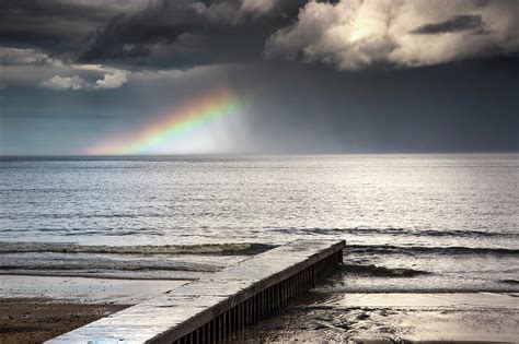 A Rainbow Shining In The Storm Clouds Photograph by John Short / Design ...