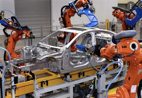 Automaker factory robotics: What it means for jobs and electric vehicle ...