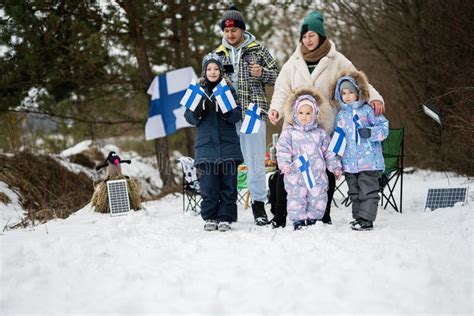 Finnish Family with Finland Flags on a Nice Winter Day. Nordic ...