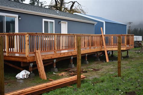 Deck with a wheelchair ramp and stairs – SUNSET DECKS