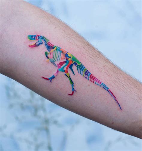 T-Rex skeleton tattoo located on the inner forearm,