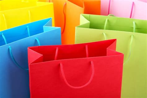 Premium Photo | Close up of colorful paper shopping bags