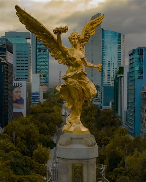 The Angel of Independence Statue near High Rise Buildings · Free Stock ...