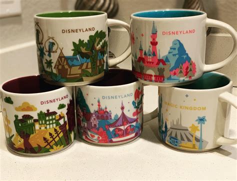 My Disney Starbucks mug collection. I love the art on these. : r/disney