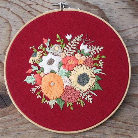 Beautiful embroidered flowers on a red background. Embroidery Sampler ...