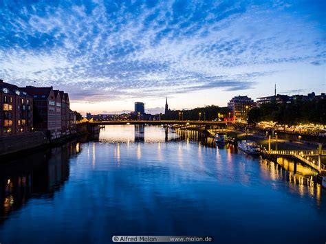 Photo of Weser river in Bremen at night. Bremen, Germany