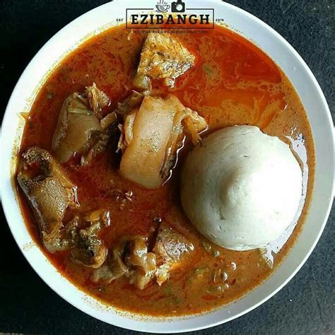 banku with palmnut soup,chicken and fish | African food, Ghana food ...