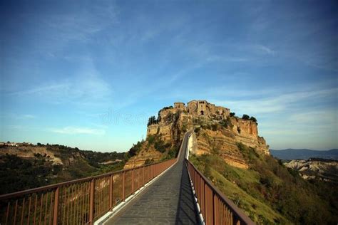 Civita Di Bagnoregio And The Connecting Pedestrian Bridge, Against A ...