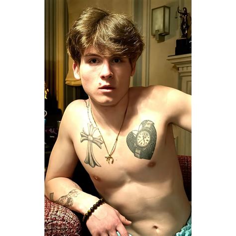 Sharon Stone's handsome son Roan, 23, unveils tattooed chest in rare ...