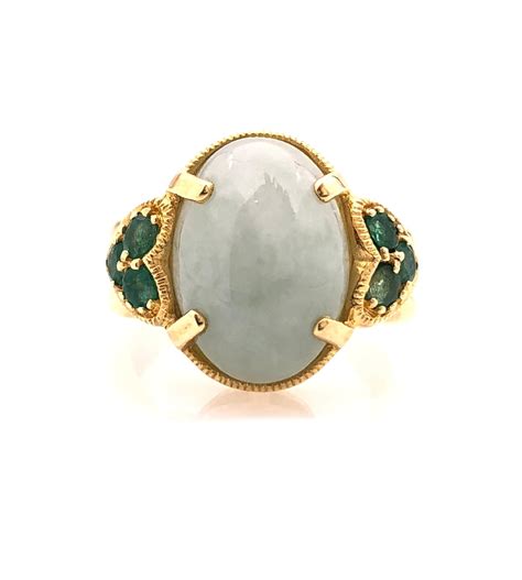 Lot - 14K YELLOW GOLD JADE EMERALD RING