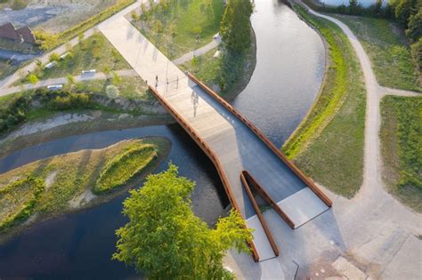 an aerial view of a bridge over a river