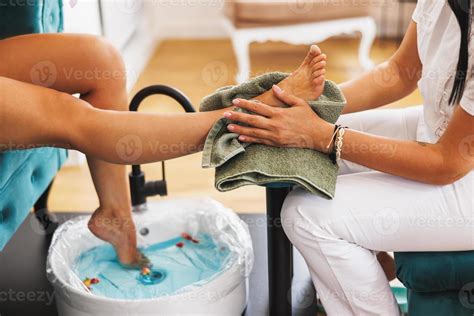 Woman Enjoying Pedicure Spa Treatment At A Beauty Salon 13898887 Stock ...