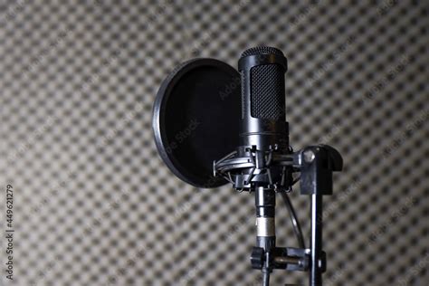 Microphones, condenser mic and mic stand with a recording studio ...