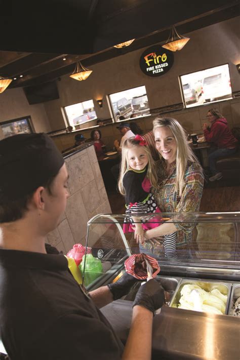 A mother and daughter ordering their Firo pizza - Firo Fire Kissed Pizza