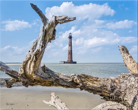 Lighthouse at Folly Beach Photograph by Mike Covington - Pixels