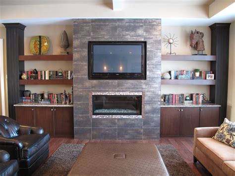 Modern linear fireplace with tile surround. | Fireplace tile surround ...