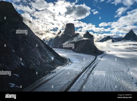 The tongue of Tupermit Glacier in Akshayuk Pass. Auyuittuq National ...