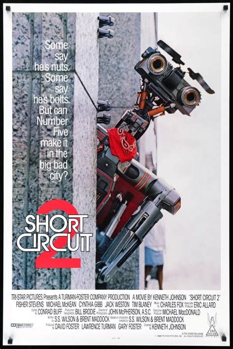 the movie poster for short circuit 2 is hanging on the wall in front of ...